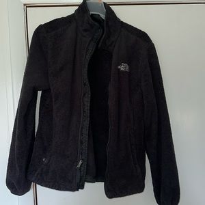 The North Face zip up jacket. No hood. Pocket on each side.